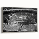 Framed canvas of a vintage-style landscape art painting featuring a black fountain design with colorful accents.