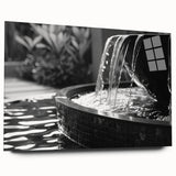 Large abstract wall art on acrylic glass featuring a monochrome architectural fountain design.