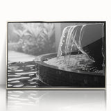 Mid-century modernist art depicting an architectural fountain in muted silver on a framed acrylic.