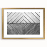 Textured abstract art print in muted gold and beige tones on a framed canvas, suitable for bedroom decor.