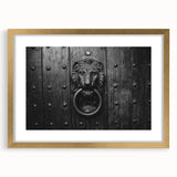 Textured abstract art print in gold frame, featuring swirling gray patterns, ideal for bedroom wall decor.