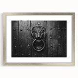 Abstract art print in silver frame, featuring geometric shapes in muted gray, ideal for dining room decor.