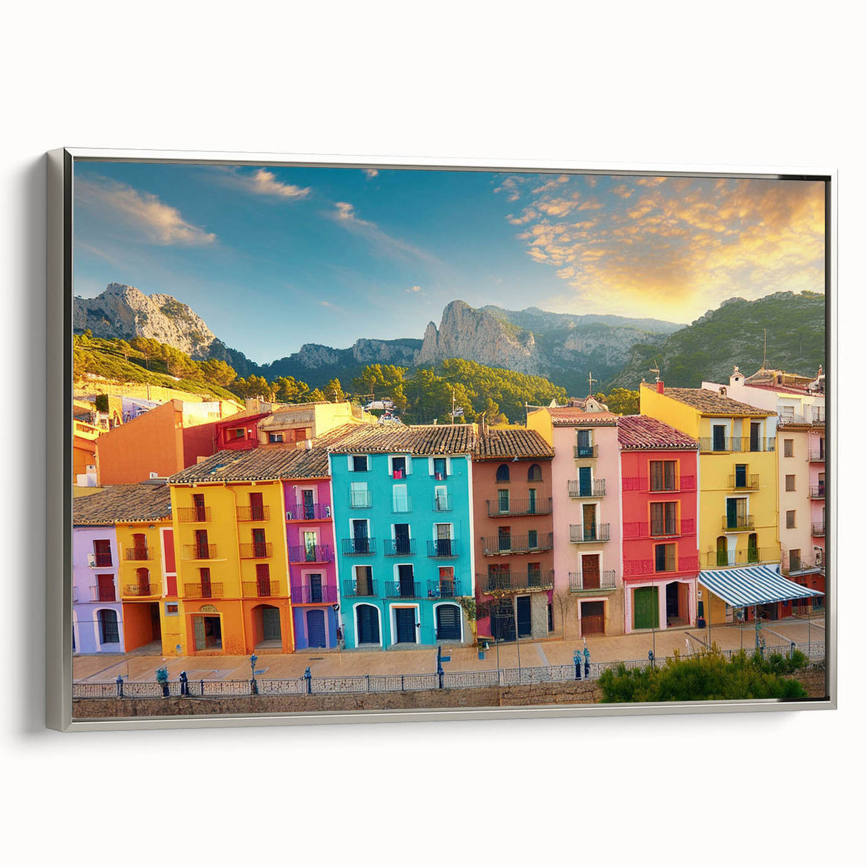Framed canvas landscape art paintings depicting colorful vintage poster art of houses.