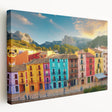 Large art depicting a row of colorful houses in abstract style on a stretched canvas, ideal for kitchen wall decor.