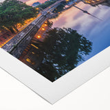 Art Deco poster featuring a geometric pattern in black and gold on a rolled canvas.