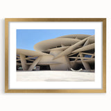 Extra large abstract art print featuring textured swirls in muted earth tones, framed in gold, ideal for living room decor.