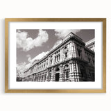 Textured abstract art print of a palace design in gold frame, featuring muted earth tones, ideal for bedroom art.