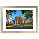 Abstract art prints of a palace design in muted gray and blue tones, framed with a silver mat.