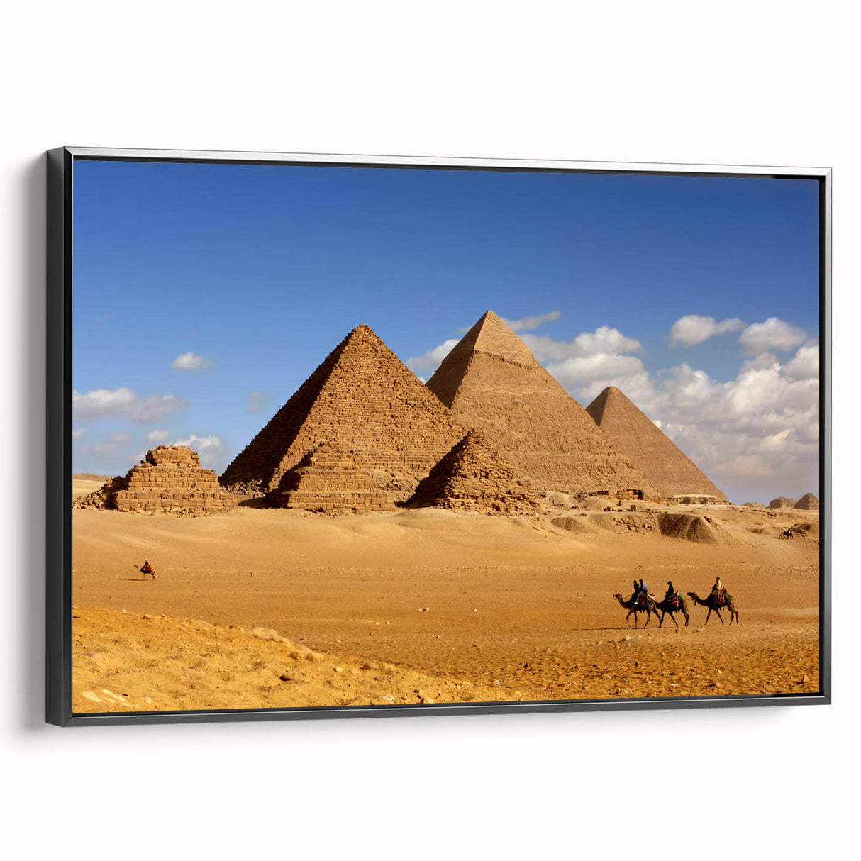 Black and white framed canvas of pyramids in a vintage poster style, suited for bedroom landscape art.