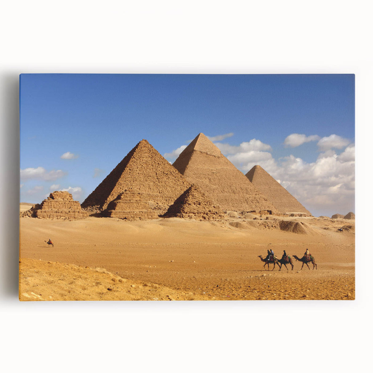 Black and white print of pyramids on stretched canvas, suitable for kitchen art with a minimalist design.