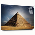 Large abstract wall art depicting pyramids in muted earth tones on acrylic glass, suitable for bedroom or dining room decor.