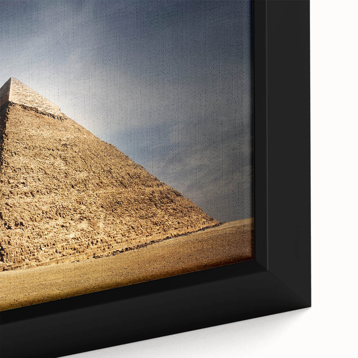 Extra large framed canvas featuring a black textured depiction of pyramids with colorful accents.