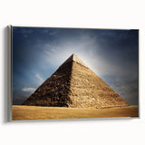 Vintage poster art of pyramids in muted black and colorful accents on a large framed canvas, suitable for living room decor.