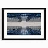 Extra large abstract art print featuring colorful, textured skyscrapers on a black framed canvas.