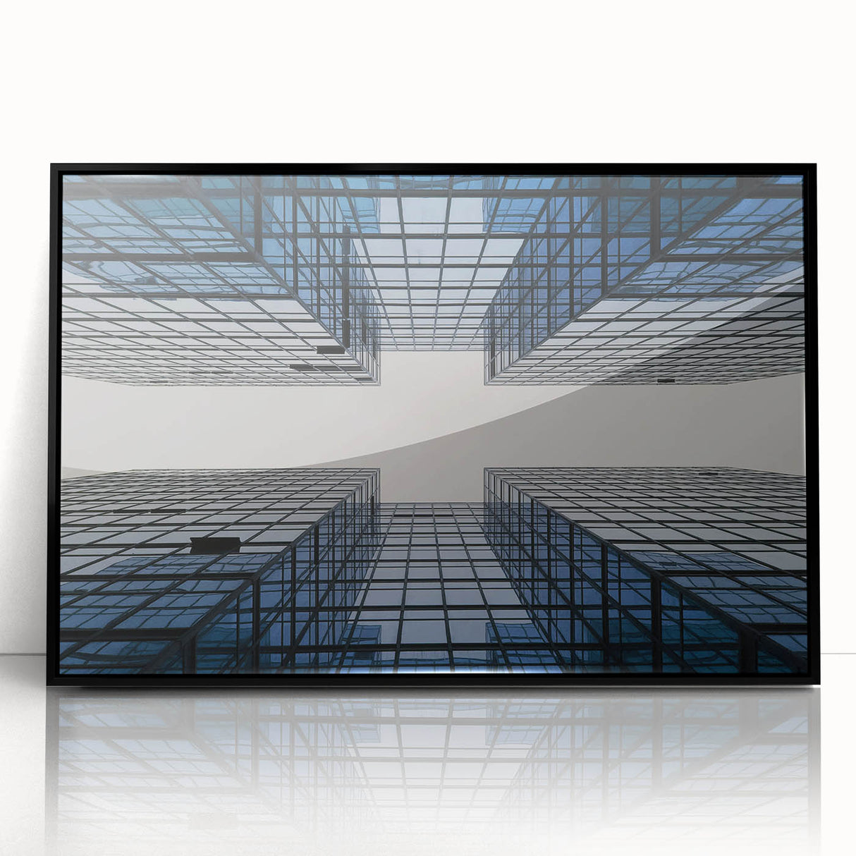 Large abstract wall art featuring a black and white skyscraper design, framed in acrylic, suitable for modern office decor.