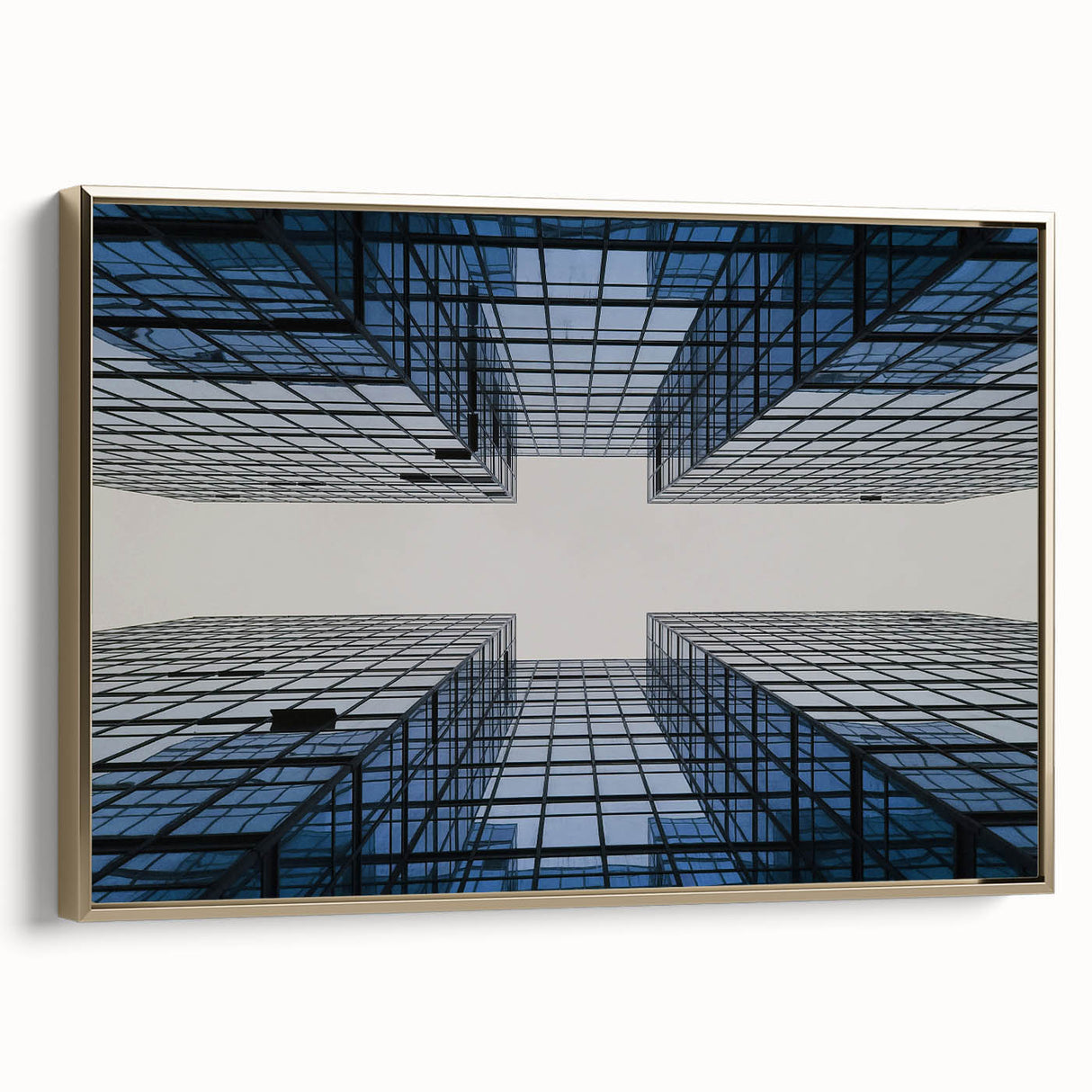 Framed canvas featuring a vintage poster of a skyscraper design in black with colorful art accents.