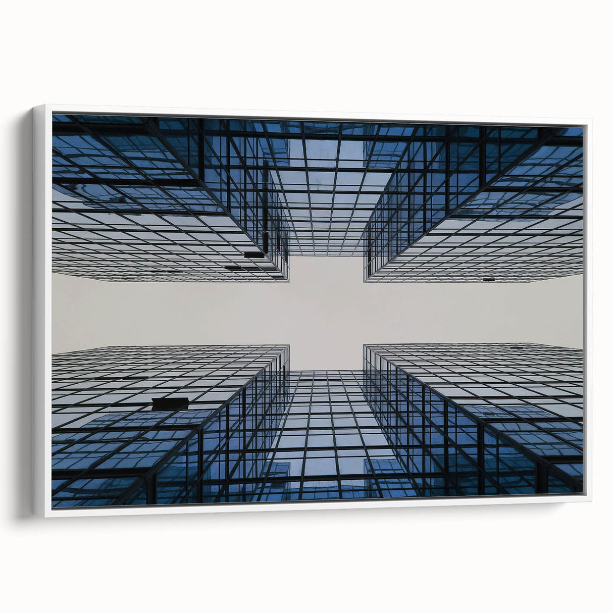 Framed canvas of a black and white vintage skyscraper design, ideal for bedroom wall art.