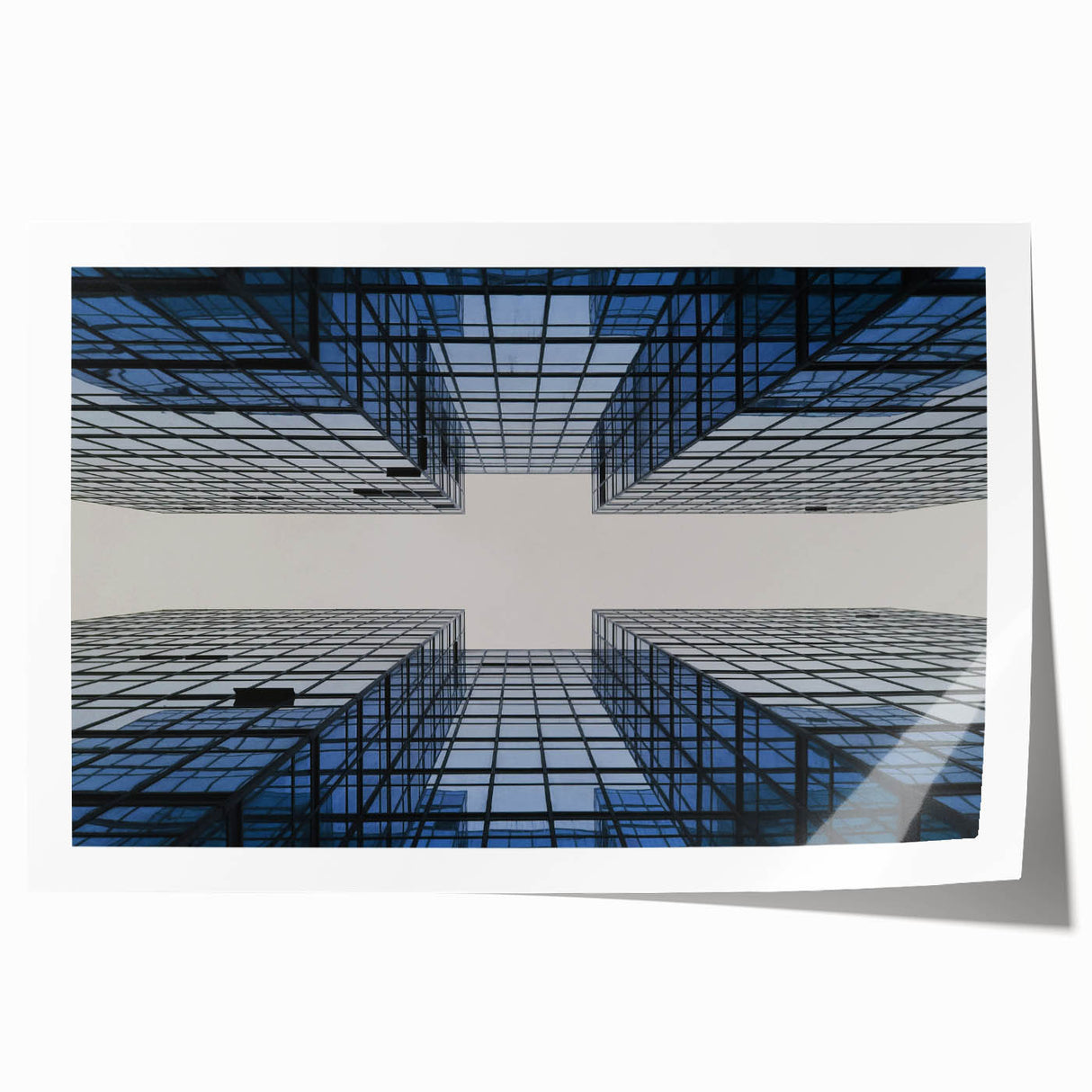 Rolled print of a skyscraper design in grayscale, suitable as art wall for dining room or classy bathroom.