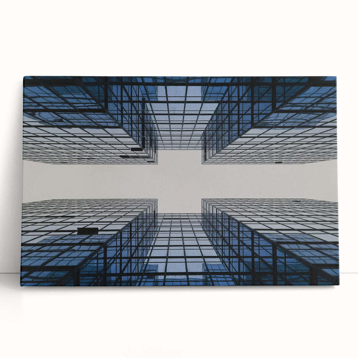 Black and white photo of skyscrapers on a stretched canvas, ideal for kitchen wall art or bedroom ambiance.