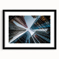 Extra large abstract art print featuring a colorful, textured depiction of skyscrapers on a black framed canvas.