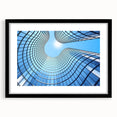 Extra large abstract art print featuring colorful, textured skyscraper design on a black framed canvas.