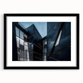 Extra large abstract art print featuring colorful, textured skyscraper designs on a black framed canvas.