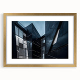 Textured abstract art print of skyscrapers in neutral tones on a framed gold mat, suitable for bedroom decor.