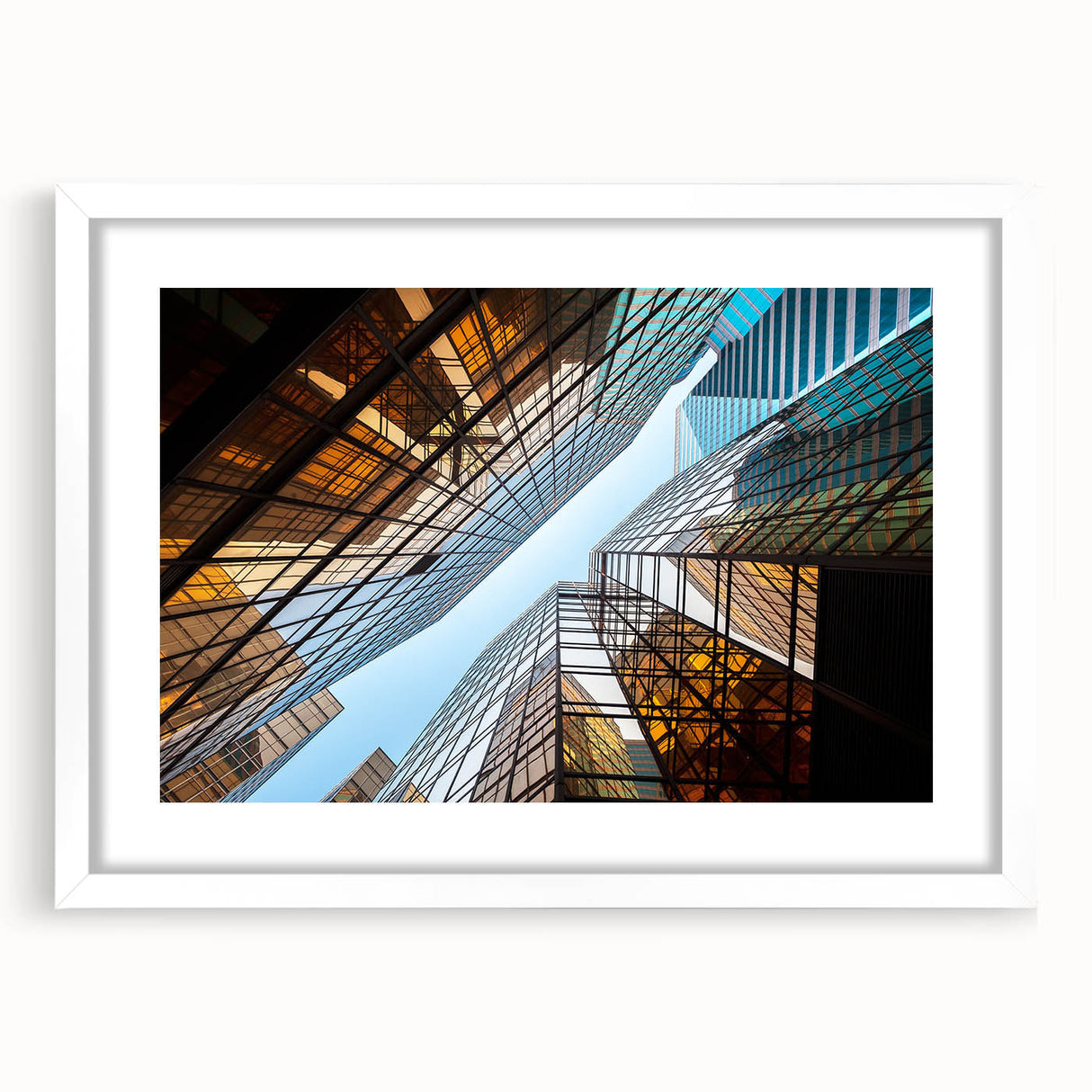 Extra large abstract art print of skyscrapers with textured design in neutral tones, framed in white.