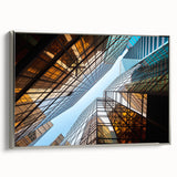 Vintage poster art of a skyscraper, featuring a black and colorful palette on a framed canvas, ideal for living room decor.