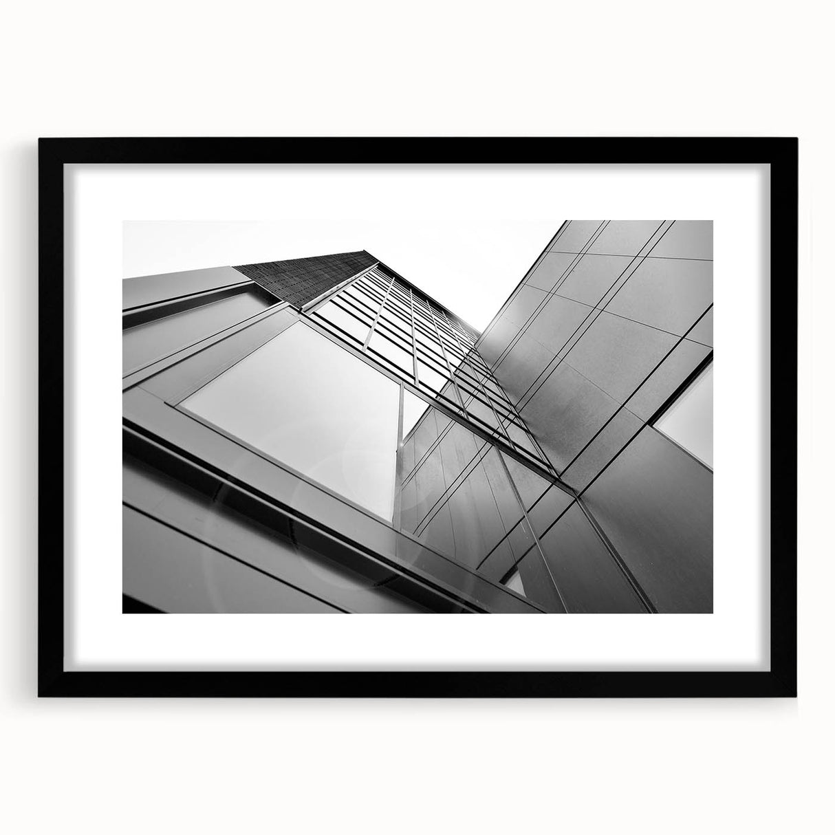 Extra large abstract art print featuring colorful, textured skyscrapers on a framed black mat, ideal for living room decor.