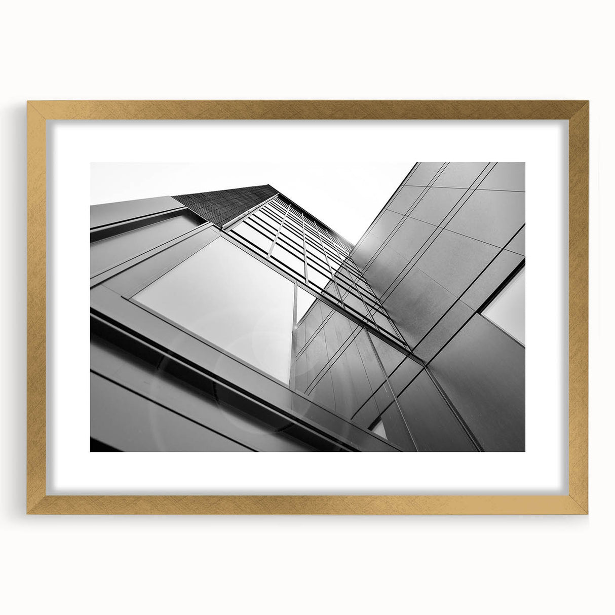 Textured art print featuring abstract skyscraper design in gold and black, framed with a mat, ideal for bedroom decor.