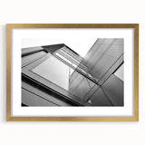 Textured art print featuring abstract skyscraper design in gold and black, framed with a mat, ideal for bedroom decor.