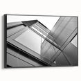 Black and white wall art featuring a vintage poster art style skyscraper landscape on framed canvas, ideal for bedroom decor.