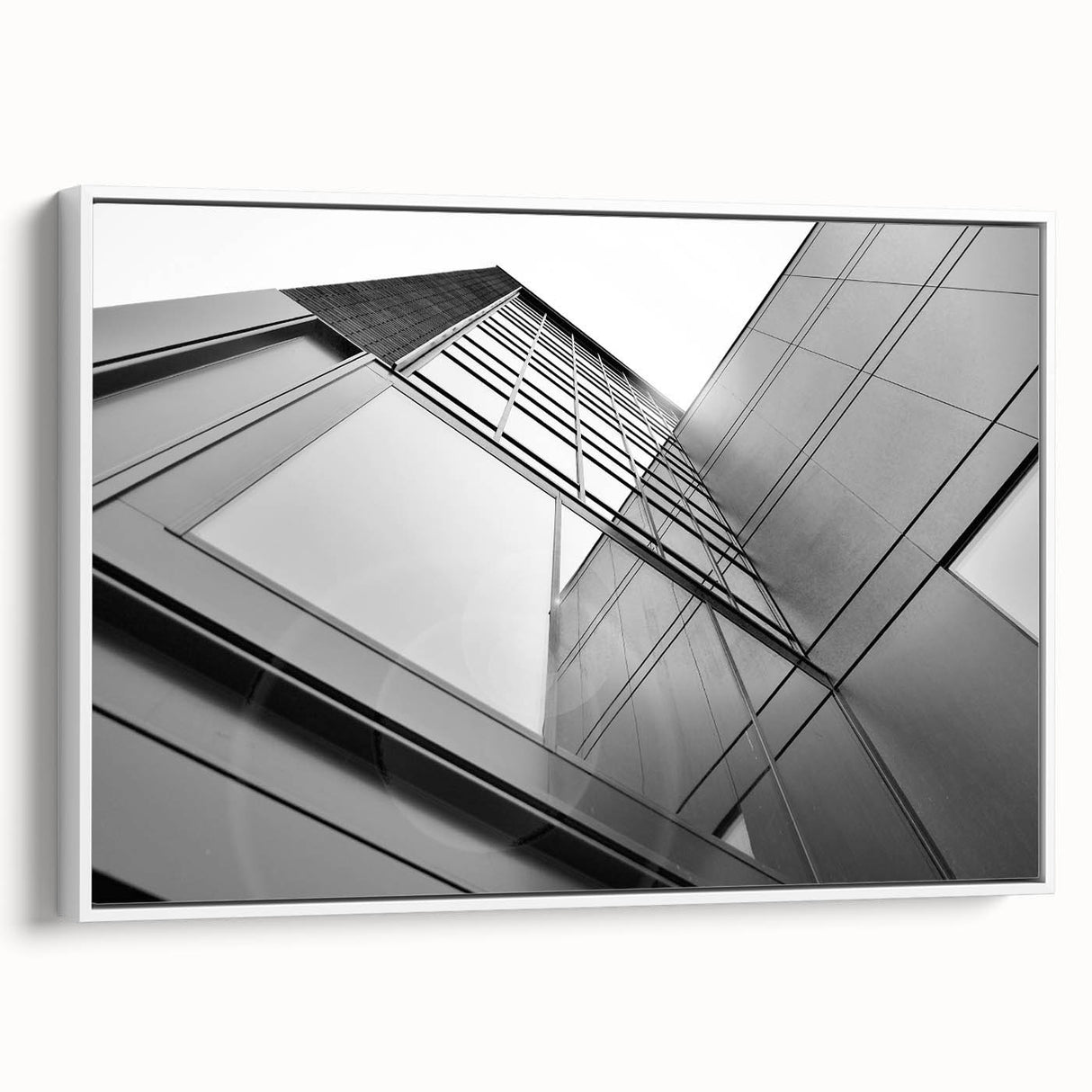 Framed canvas of a monochrome skyscraper design, ideal for modern bedroom décor.