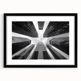 Extra large, abstract art print featuring colorful, textured skyscraper designs on a black framed canvas.