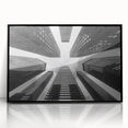 Large abstract wall art depicting a skyscraper in black and white tones on a framed acrylic.