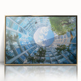 Mid-century modernist art depicting skyscrapers in gold and black tones on a framed acrylic.