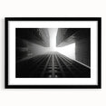 Extra large abstract art print of colorful skyscrapers on a textured canvas, framed in black, suitable for living room decor.
