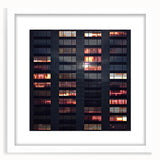 Extra large abstract art print featuring textured skyscraper design in muted gray, framed in white.