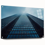 Large abstract wall art on acrylic glass depicting a skyscraper design in cool gray tones.