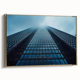Framed canvas of a vintage skyscraper design in black with colorful accents, ideal for office wall decor.