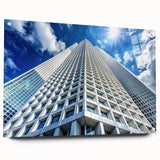 Acrylic print of a large abstract skyscraper design in cool blue and gray tones.