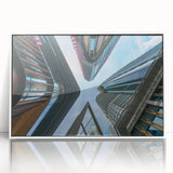 Large art print of a mid-century modernist skyscraper design in black and white on framed acrylic.
