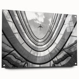 Large abstract wall art of skyscrapers in muted gray tones on acrylic glass, suitable for dining room or bedroom decor.