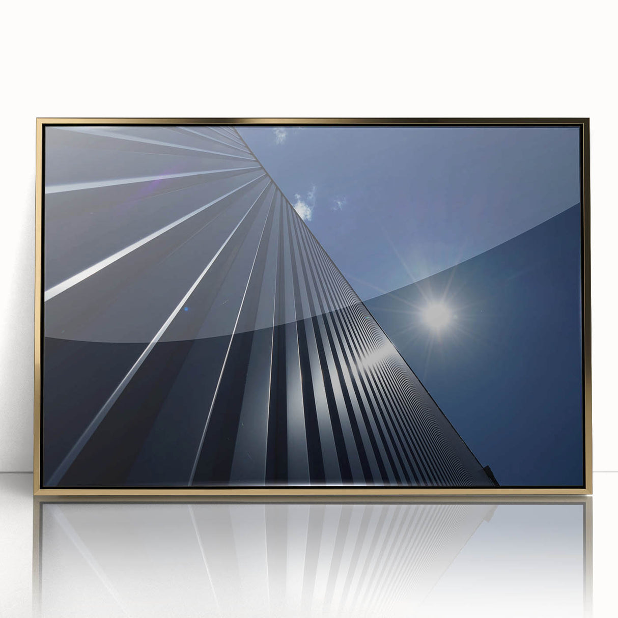Mid-century modernist art of a skyscraper in gold and black tones on framed acrylic, suitable for modern art wall decor.