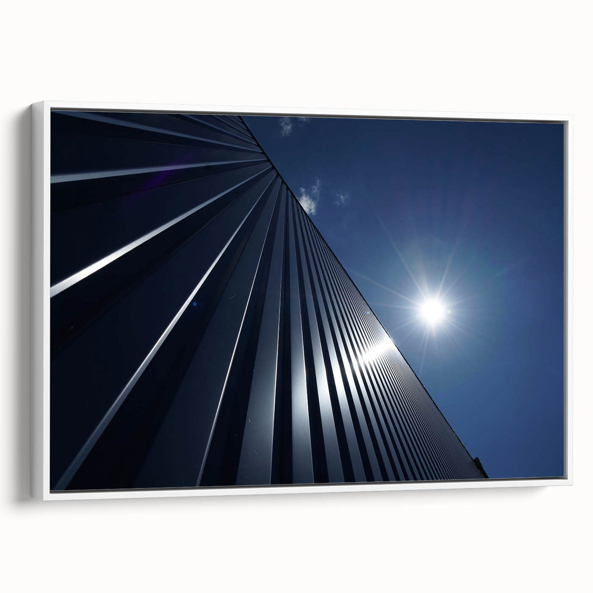 Framed canvas featuring a black and white vintage poster of skyscraper architecture, suitable for bedroom wall art.