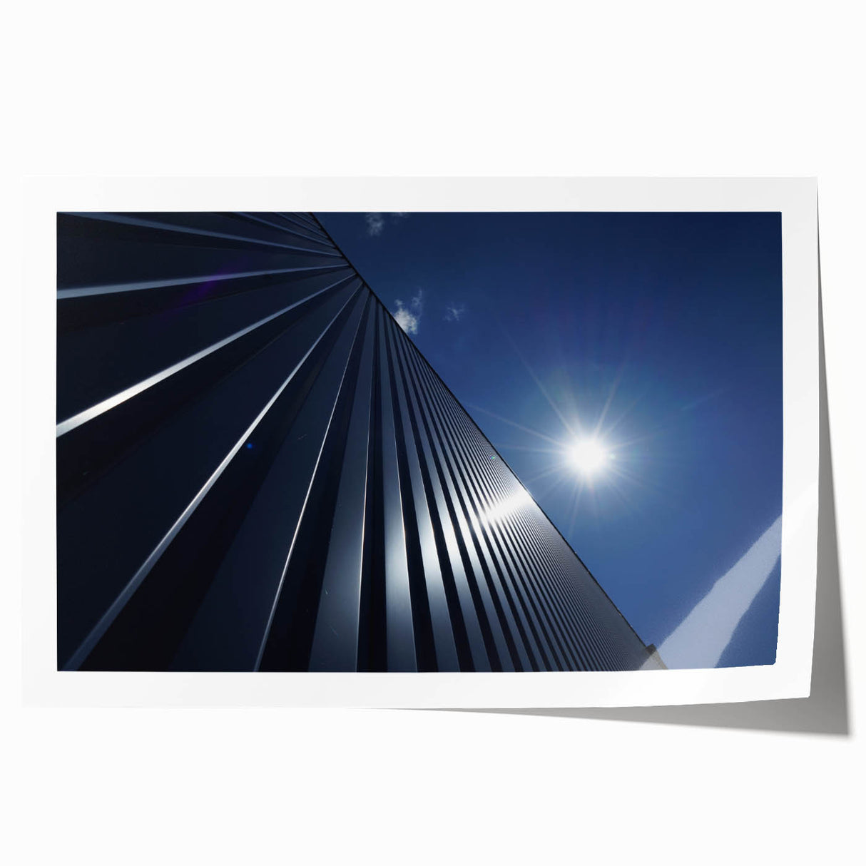 Rolled print of a skyscraper design in monochrome tones, ideal for modern dining room or bathroom decor.