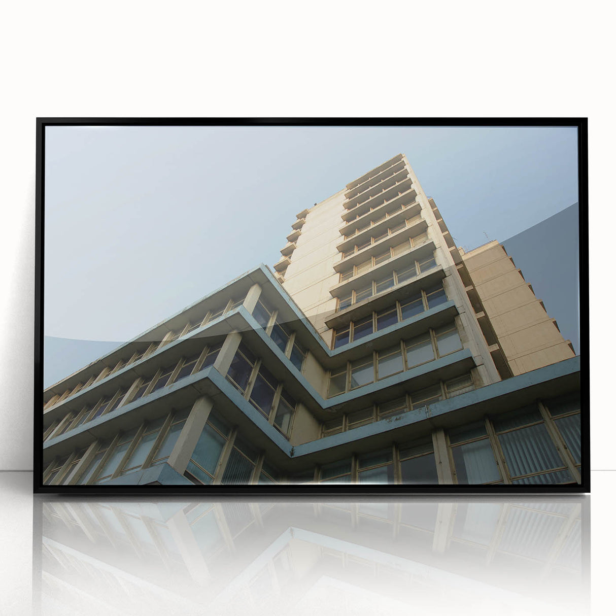 Large abstract wall art featuring black and white skyscraper designs on a framed acrylic, ideal for modern office decor.