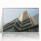 Framed acrylic print of mid-century modernist skyscraper design in monochrome, ideal for modern art wall decor.