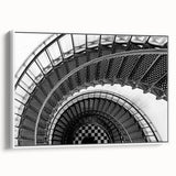 Vintage poster art of a spiral staircase in black and white on a framed canvas, ideal for living room decor.